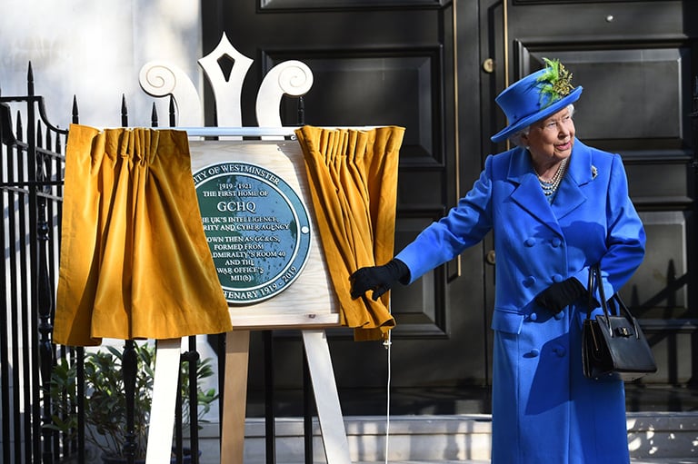 Her Majesty The Queen unveils a plaque outside Watergate House, London, to mark GCHQ's centenary.