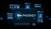Glowing blue passkey authentication concept with fingerprint hologram, password interface, and digital icons on dark background.