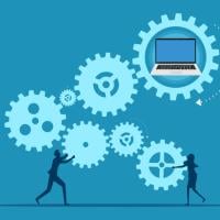 Image showing turning cogs with a laptop in the middle of one