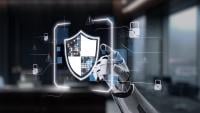 robot hand pointing to screen showing shield with padlocks 