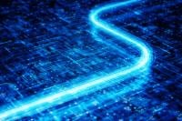 Glowing light blue speed network on a futuristic digital circuit board.
