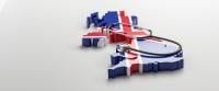 Healthcare in Great Britain concept: A stethoscope on a 3d map of Great Britain overlayed by the British flag
