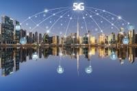 5G network wireless systems and internet of things with modern city skyline
