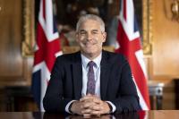 Steve Barclay, MP sitting at a desk