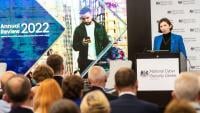 Lindy Cameron, CEO of the NCSC, delivering a speech in front of an audience in the NCSC's HQ