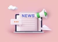 Laptop on a pink background with a newsletter showing on the screen